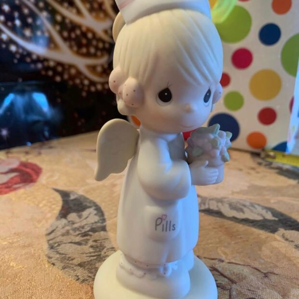 New listing: Precious Moments Angel of Mercy
